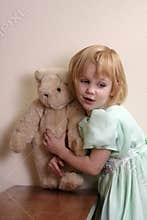 Cute girl with teddy bear