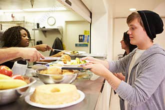 Kitchen Serving Food In Homeless Shelter