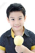Cute boy with apple on white background