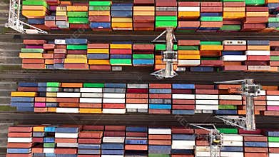Drone shot of modern industrial container port of Rotterdam with containers from top view.