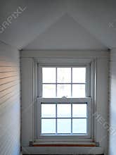 Home: white attic window