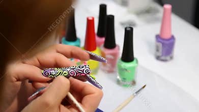 Applying intricate nail art colorful polish manicure beauty salon care design stock footage Generative AI