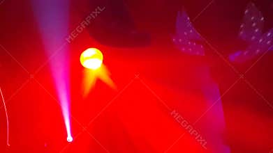 Scenery and lighting equipment working in a nightclub