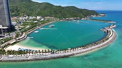 Aerial view of luxury Ana Marina Nha Trang with beach club and bay for yachts. Northern part of city, central Vietnam