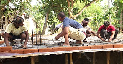 Bhadrak, Odisha, India - Dec 27 , 2024 : Construction Workers Working on Site