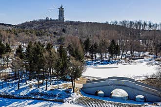 Early Spring Snow - View of the Tower at Jingyuetan National Forest Park, Changchun, China