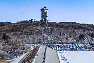 Early Spring Snow - View of the Tower at Jingyuetan National Forest Park, Changchun, China