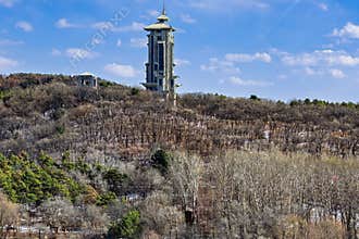 Early Spring Snow - View of the Tower at Jingyuetan National Forest Park, Changchun, China
