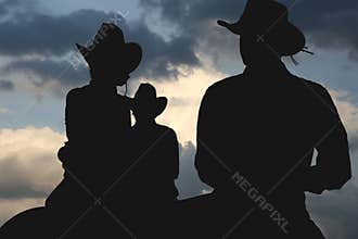 Cowboys in the morning silhouette