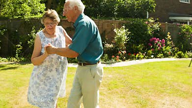 Elderly couple dancing