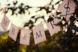 Mr. & Mrs. wedding sign on the flags