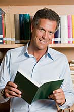 Mature man in library
