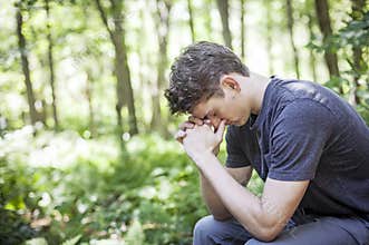 Young man praying