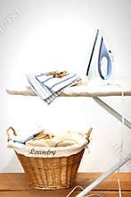 Ironing board with laundry