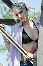 Woman in bra bikini, shirt and bandana