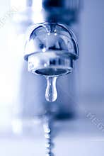 Water drop from a faucet