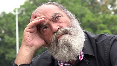 Old Bearded Man Thinking