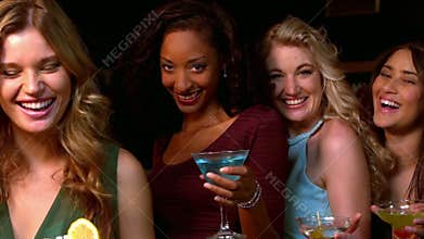 Group of friends having a cocktail