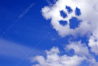 Dog paw trail in the sky clouds