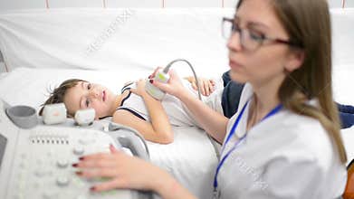 Cute Boy Being Diagnosed at Ultrasound Device