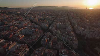 Aerial cityscape of Barcelona at sunset