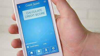 Checking credit score on smartphone using application. The result is EXCELLENT