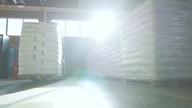 Bottom View Motion along Bag Piles and Driving Forklift