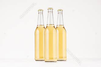 Group transparent longneck beer bottle 500ml with lager, mock up.