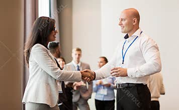 Handshake of people at business conference