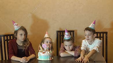 Children boring on birthday party. birthday cake for little birthday girl