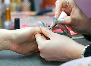 Manicure in beauty salon