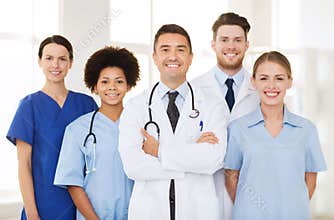 Group of happy doctors at hospital