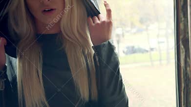 Portrait of the beautiful blond rapper girl