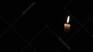 Candle flame, isolated on black background