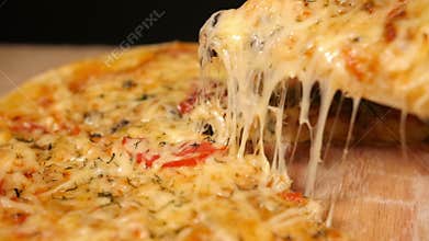 Taking Slice of Pizza with Chicken and Mushroom