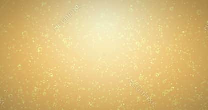Golden bubbles movement inside a glass of champagne on gold background