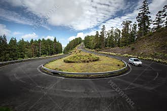 Car on the road through u-turn corner - Azores Sao Miguel Portugal