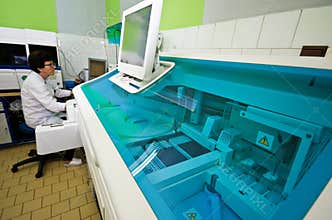 Blood analysis machine in laboratory
