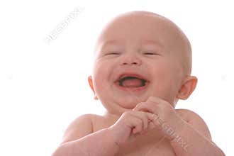 Laughing baby on blanket