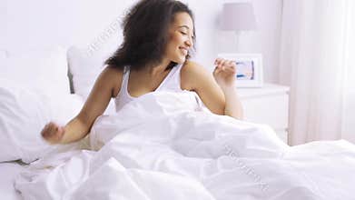 African woman sleeping in bed at home bedroom