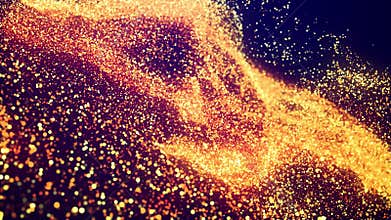 Abstract bg, golden magic glitters fly in air in slow motion and form beautiful swirls. Fiery sparkles float in viscous