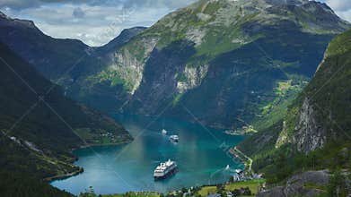 Timelapse of Geiranger fjord, Norway with cruise liner ship and boats