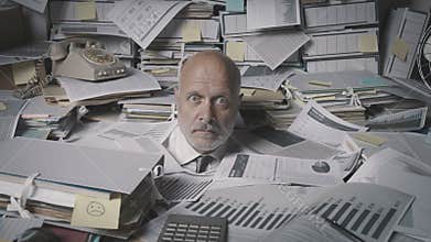 Stressed accountant overwhelmed by work