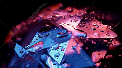 Rotating sparkling diamond in red and blue colors