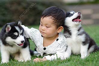 Girl play with puppy