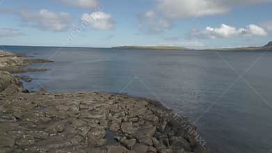 Lighthouse and old coastal fortifications with artillery on Faroe Islands
