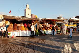 Market stalls on Djemaa el Fna in evening light, Marrakesh