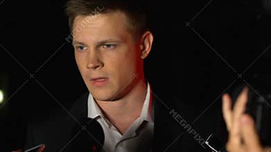 Famous businessman refusing answer journalists questions, mass media attention