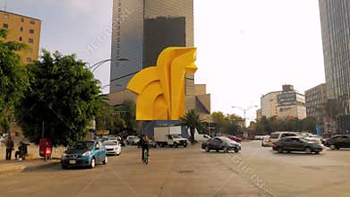 Paseo de la Reforma at morning sunrise with traffic in Mexico City