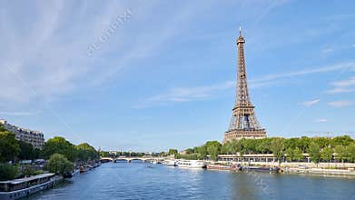 Eiffel Tower and Seine river in Paris in a sunny day in France